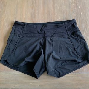 Lululemon “speed up” short in black. Size 6 (4 inch inseam)